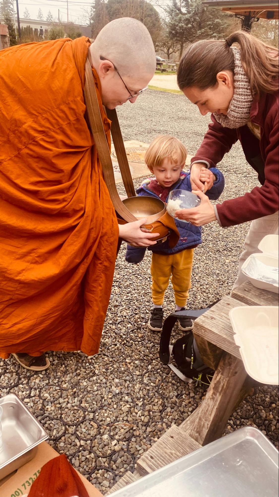 child-offers-alms A child offers alms to Ayya